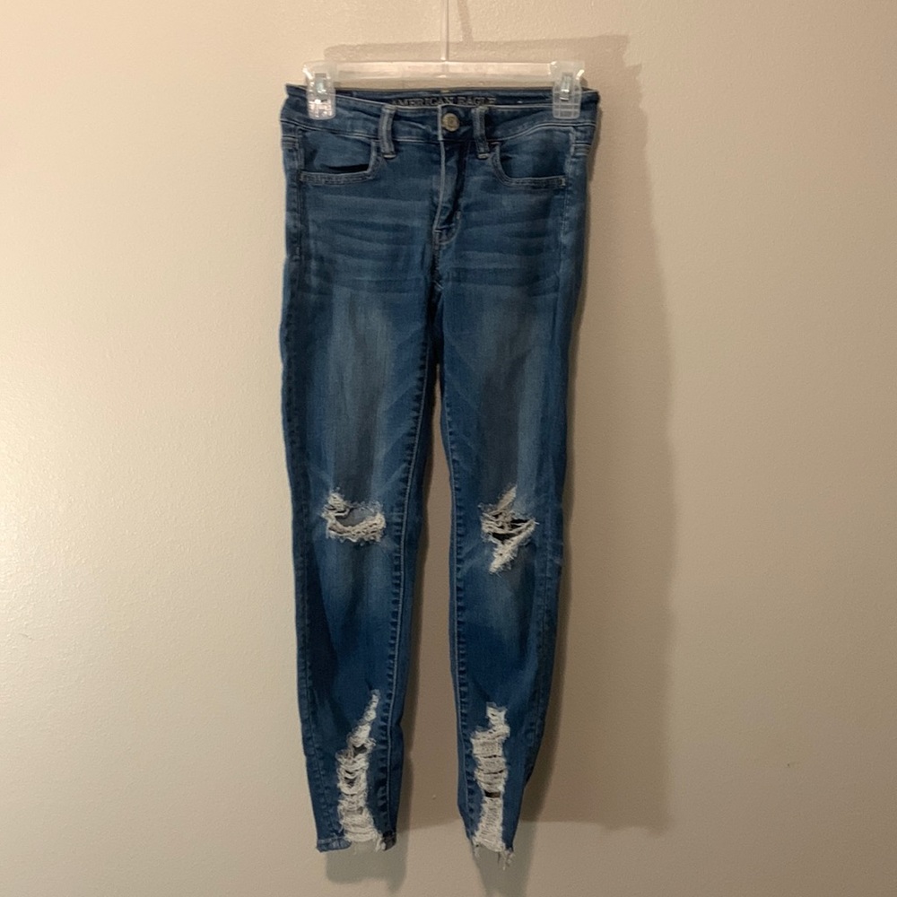 Selling distressed jeans because they do not fit
